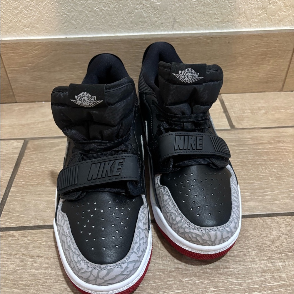 Nike Black and Gray Sneakers with Red Soles